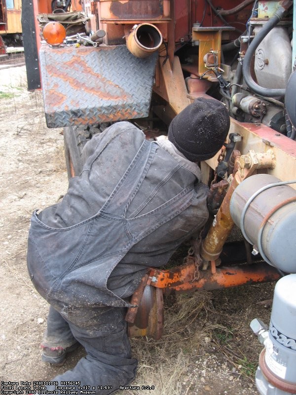 Tom removing the starter to be rebuilt