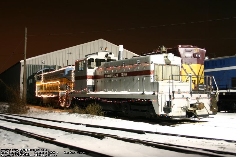ComEd 14 & NP 14 lit up with strings of lights