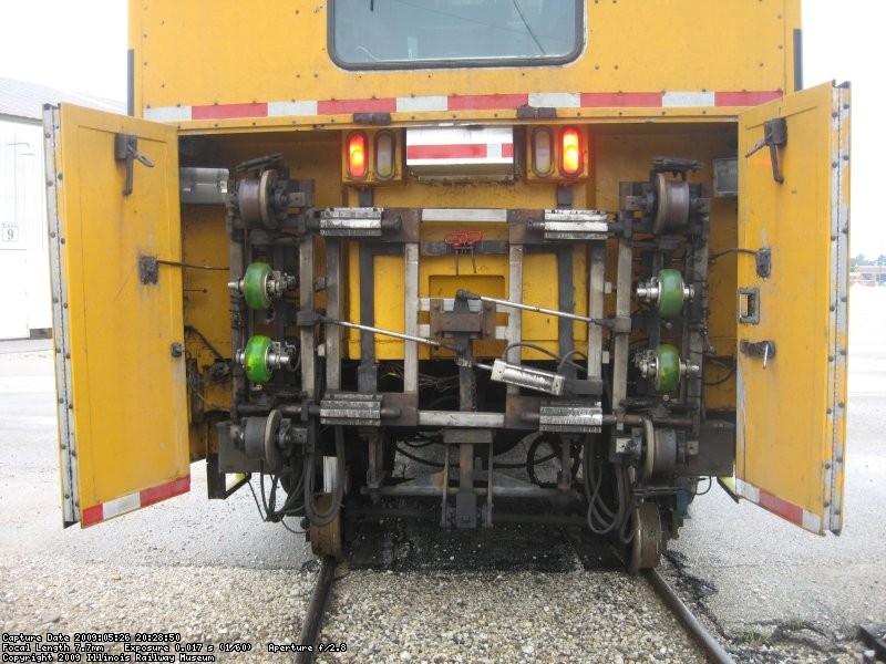 The testing buggy.  The green rollers do the ultrasonic testing