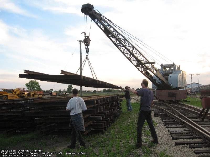 Warren, Nathan and Jamie get the track panels neatly stacked