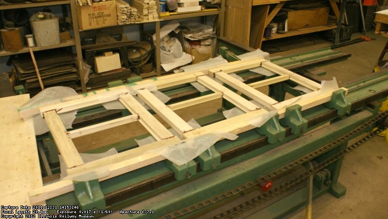 New windows in press. Historical photos indicated replacements should be two sash four pane windows.
