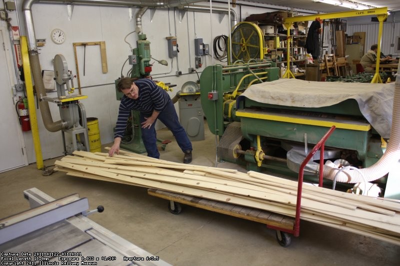 Bill Moran stacks up the completed roof planks - 01/22/2011.