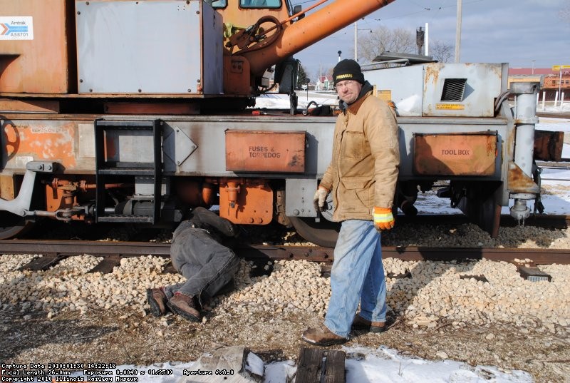 Tom (on the ground) and Frank troubleshooting the Model 50 Burro