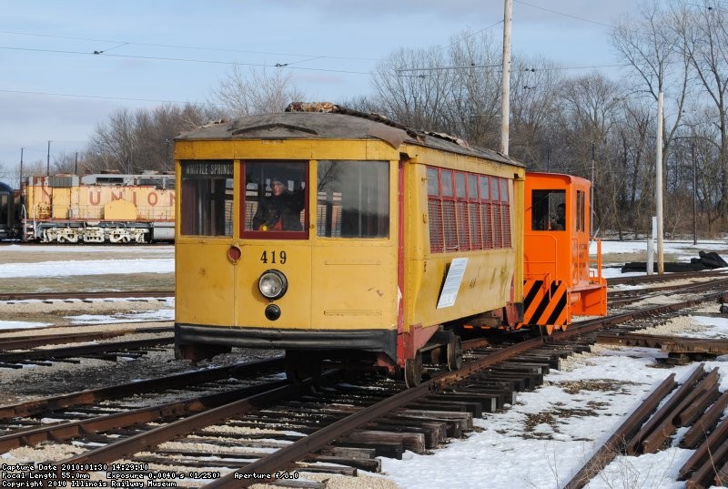 Greg inside the streetcar leads the shove into Barn 11