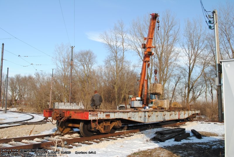 Unloading 6000 lb concrete blocks.  Big cranes are handy tools