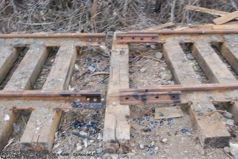 Bars bolted to the rail until we are ready to move the panels.