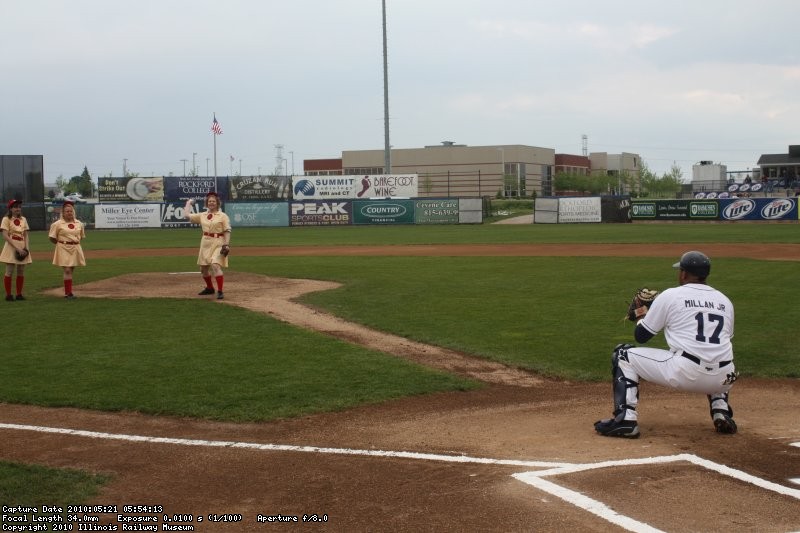 Rebecca, representing IRM, throws out the first pitch.