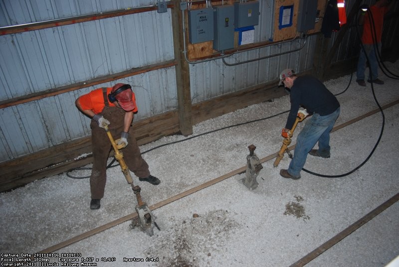 Gun tamping the low spots in the barn.