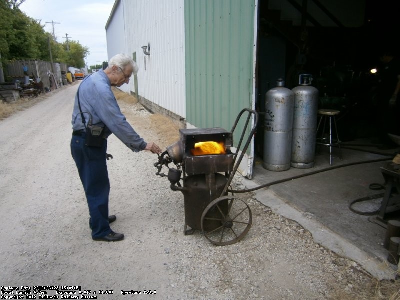 Working again Tom tests the rivet furnace