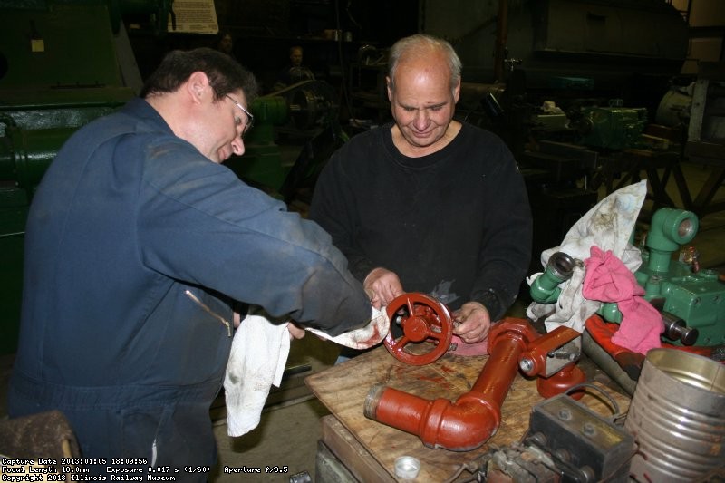 Stu and Bob work on planer parts