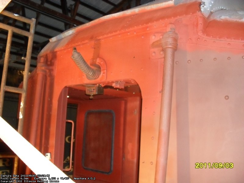 Exterior almost all primed  Notice bent spring It has now been replaced w/ new one in anticipation for buffer installation 9-3-2011