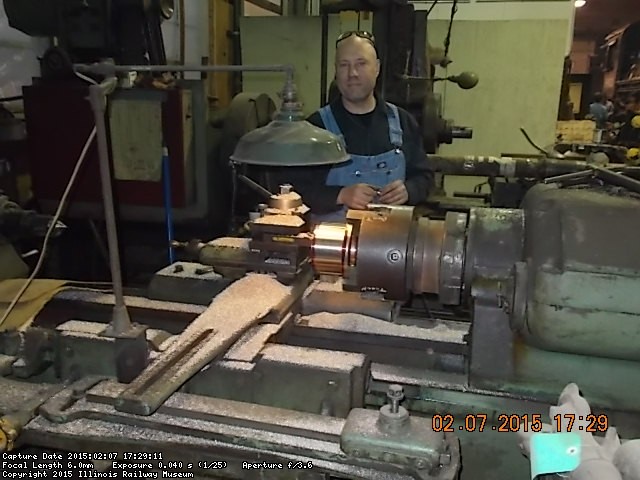 This is Eric Hoyem one of the steam shop machinists working on a new bearing for the 1630's side rod 2-7-15   DSCN1254