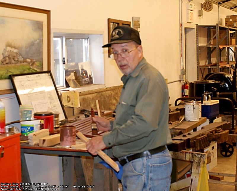 Pete G. in the shop painting parts for Charles City Western 300