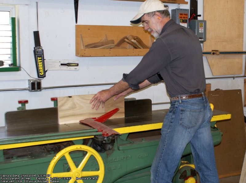 Yours truly running replacement Depot Door panels through the jointer after blade replacement. Photo by Buzz Morisette.