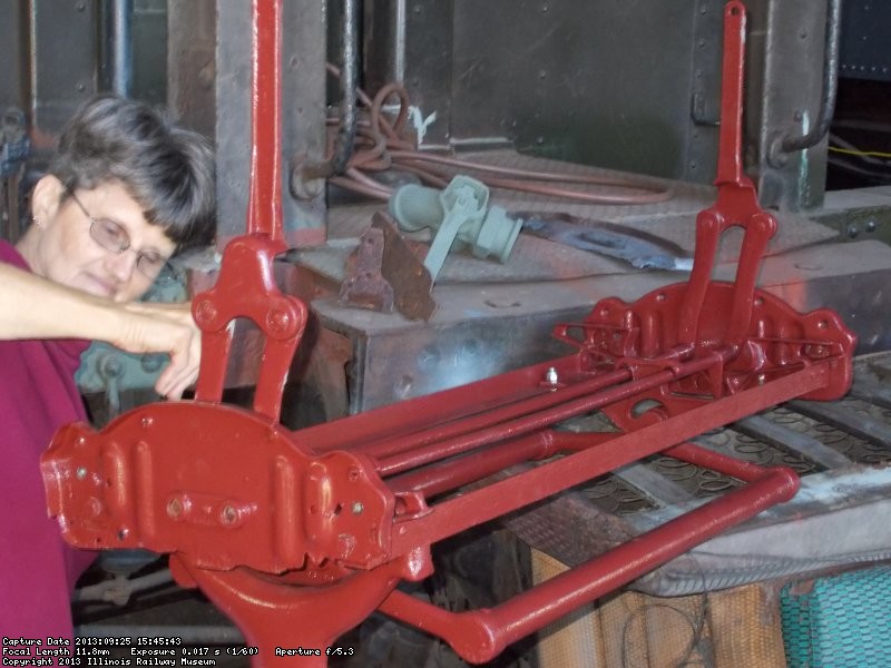  Here  Loraine Bixler is painting the first rebuilt seat frame  DSCN0589