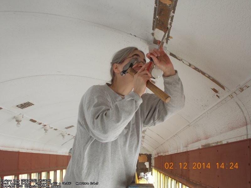  Jane is also scraping old paint off the ceiling                   DSCN0728