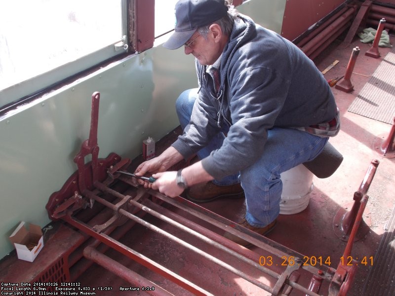 A first, Gary reinstalling a seat frame  We have 12 move to clean and paint.  3-26-14   DSCN0770