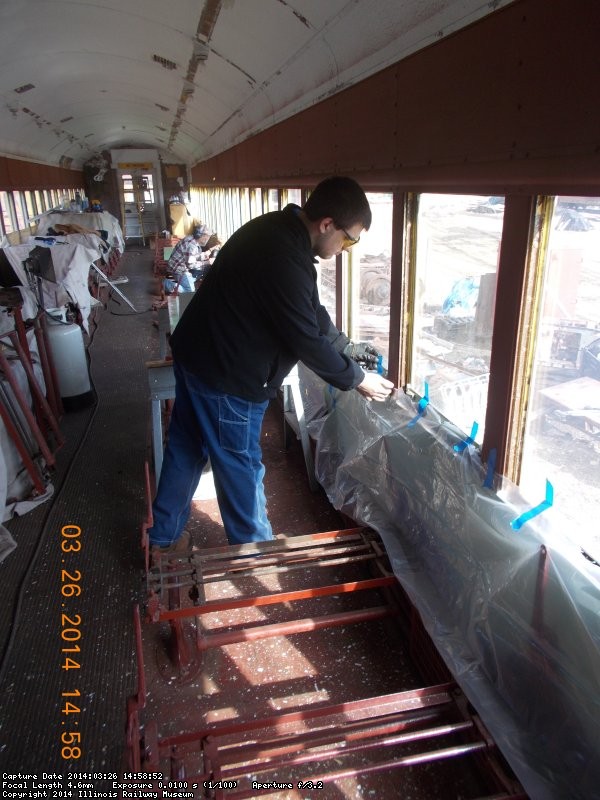 Here's Christian from the Steam dept helping us on a Wednesday. He's covering the newly painted panels w/ plastic.   Thanks for the help! 3-26-14  DSCN0772