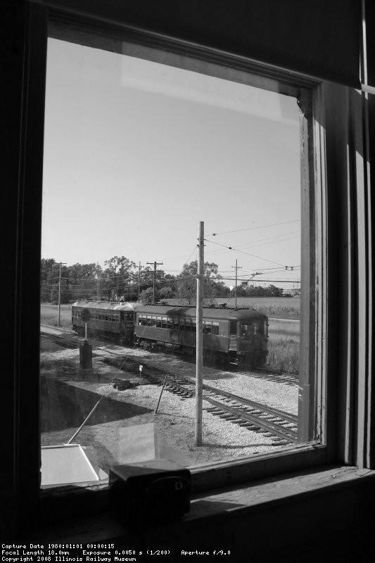 CNS&M 160 & 714 roll westbound on the main past Spaulding tower