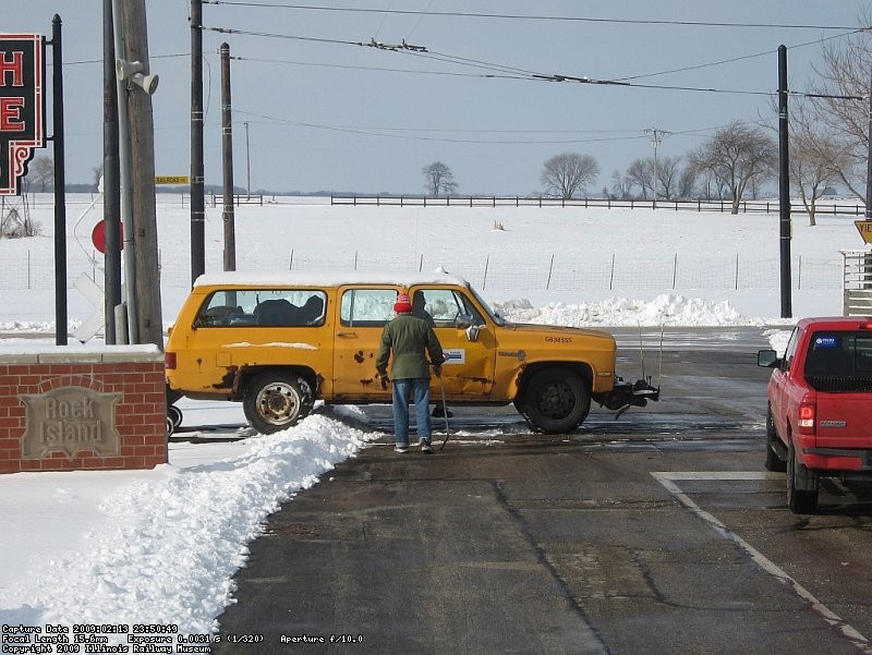 Signal dept setting their hi-rail truck on the tracks at Central Ave