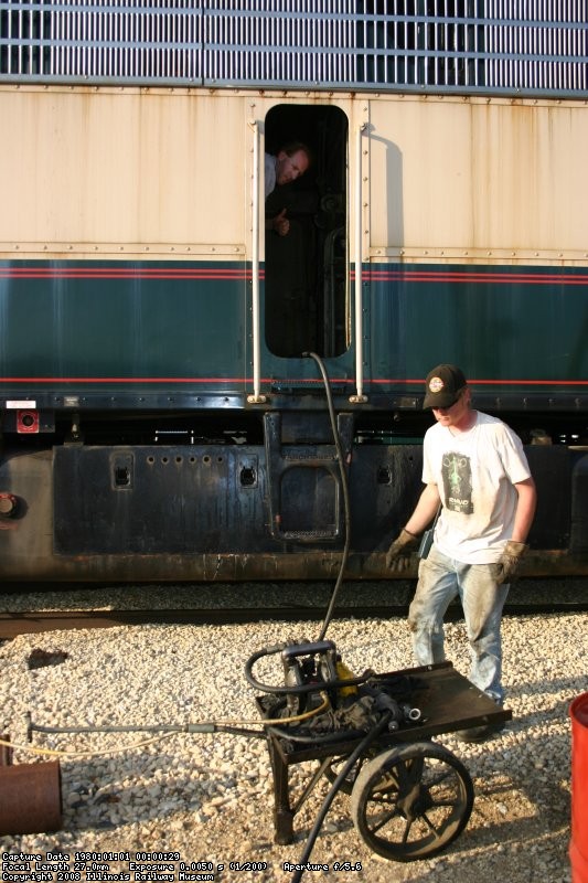 Warren and Jamie pump oil into the BN-3