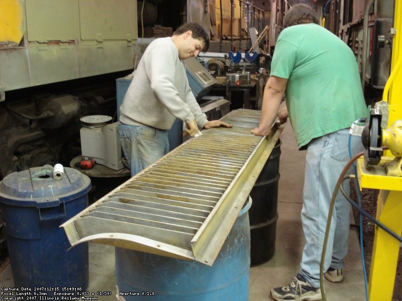 Dan and Brad sanding a dynamic brake louver 