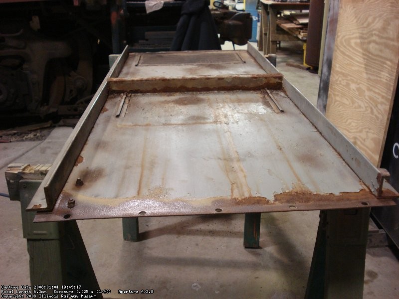Short hood side panel before sanding and needle chipping