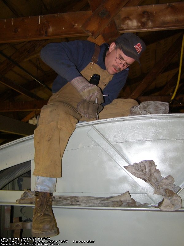 The other Roger works at drilling and tapping the holes for the HEP cooling hatch