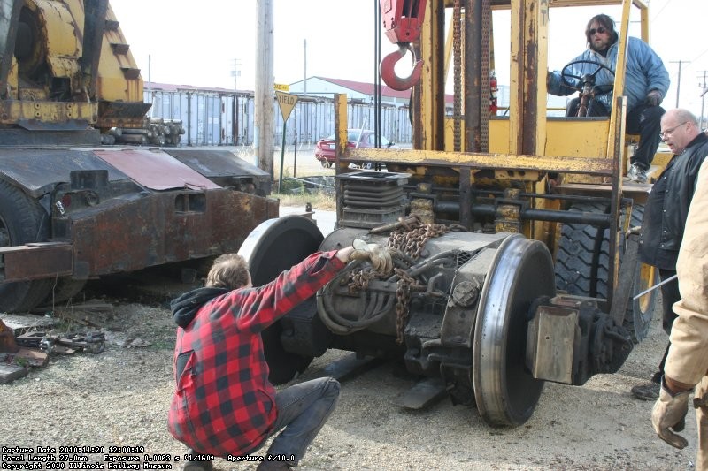 Jeff C. running the forklift to move the combo into the shop.