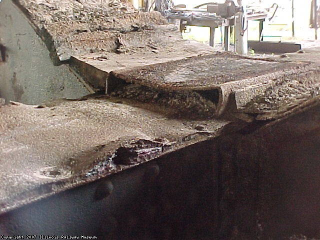 THE UNDERFRAME TOP COVER PLATE AND TANK ADDLE ARE CORRODED BY COMMODITY.  THEY WILL BE REPLACED.