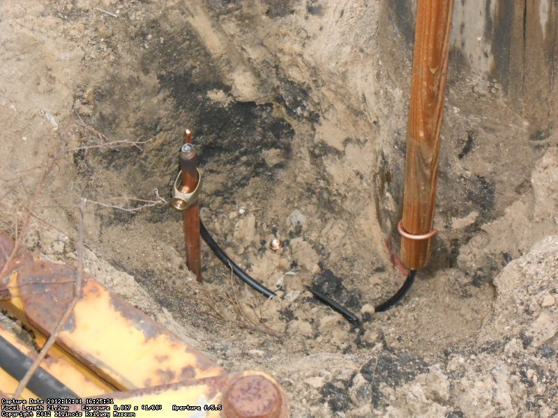 #4 ground wire connected to ground rod with shear head connector (acorn).