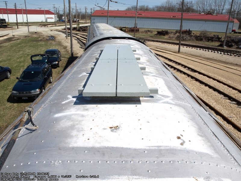 Trolley boards partly installed on roof.