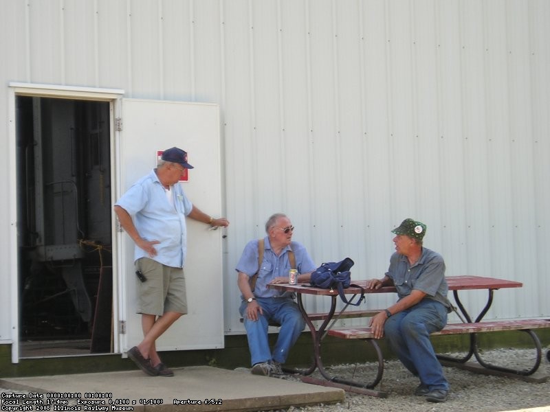 08/11/07 Nick Kallas looks on while Bob Hunter and Bob Kutella discuss primer