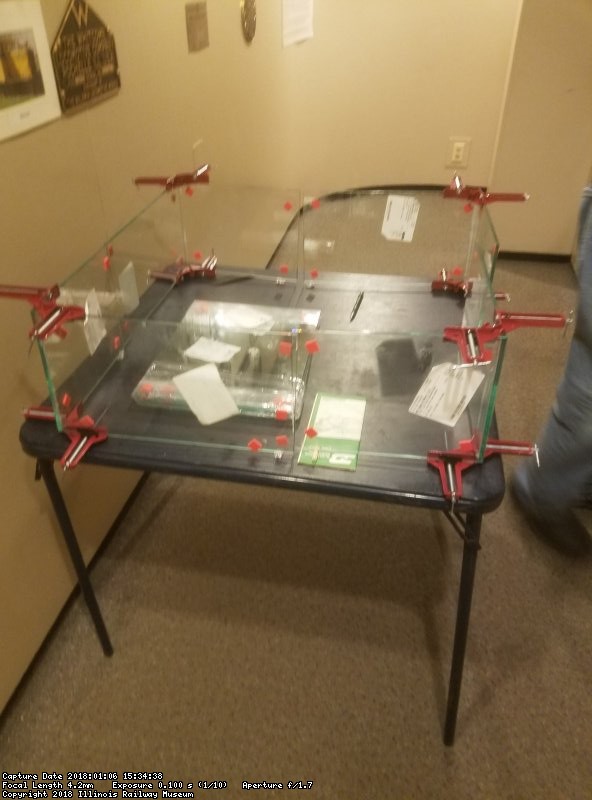 One display case has been glued and clamped, courtesy of Mashell Gellman