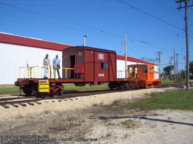 09.12.07 - JAMES FAULHABER, LEFT, AND HIS FATHER JOHN TAKE A RIDE ON THE CABOOSE WHILE THE CABOOSE MAKES ITS FIRST TRIP TO THE MAINLINE SINCE RESTORATION COMMENCED.