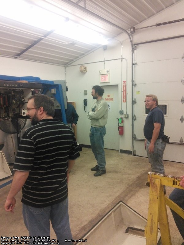 Rich, Greg, and Joe watch as Brian P. runs the controller and the machine spins engaging its many different contacts - Photo by Brian LaKemper