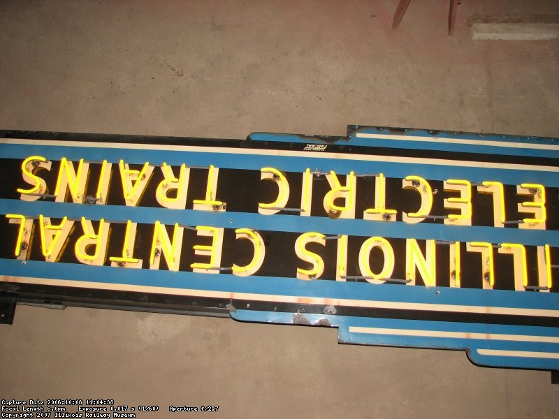 The restored IC electric sign in the B&G shop before mounting on barn 6.