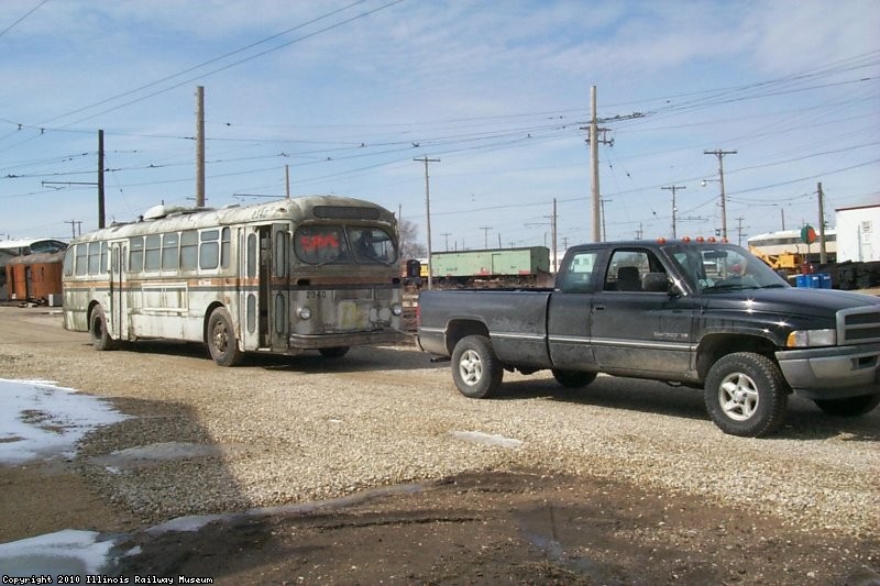The Dodge Ram does extra heavy duty towing the 2340 to the Trolley Bus Garage (03/17/2001).