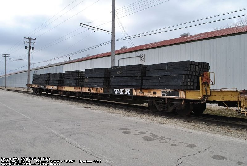 First full load of new ties on the flatcar ready to be distributed along the mainline. 3-12-11