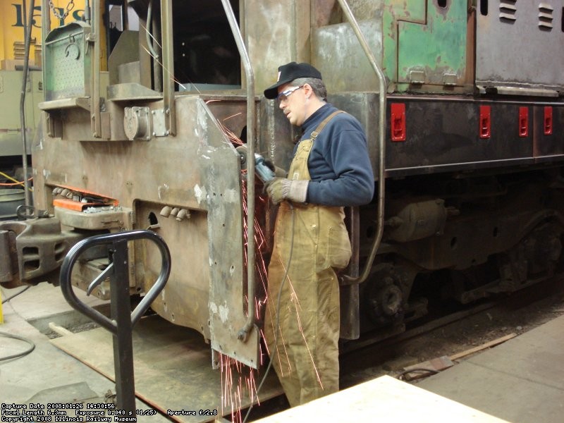 Roger B. grinding welds in step well