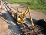 Adam and the tie crane at work unloading ties at Johnson siding. 