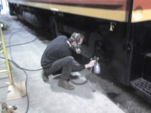 Jamie painting trucks and tanks on CBQ 9255