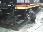 Jamie painting trucks and tanks on CBQ 9255 Jamie painting trucks and tanks on CBQ 9255