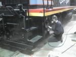 Jamie painting trucks and tanks on CBQ 9255