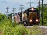 CNW 6847 and 4160 lead the caboose train on 7/18/09