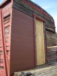 10.08.06 - KIRK WARNER HAS APPLIED THE FIRST FEW ROWS OF NEW SIDING.