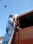 05.19.07 JOHN FAULHABER IS STARTING TO APPLY HEAT TO THE TIMBER BOLT NUTS SO THAT THEY CAN BE REMOVED AND REUSED.