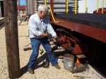 08.26.07 - NO RAIN TODAY.  KIRK WARNER IS REMOVING THE OLD LUBRICATING PAD, AS HE STARTS TO REPACK THE L3 JOURNAL BOX.