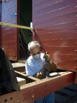 09.02.07 - WITH THE A END NOW COMPLETE, DICK CUBBAGE STARTS THE NEEDLE CHIPPING ON THE B END, WHICH IS NECESSARY BEFORE PAINTING AND STARTING THE APPLICATION OF THE NEW DECKING.