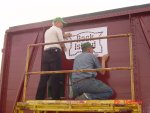 09.29.07 -  VICTOR HUMPHREYS ASSISTS BOB KUTELLA IN POSITIONING THE ROCK ISLAND HERALD STENCIL SO THAT BOB CAN TRACE IT ON THE SIDE OF THE CAR.